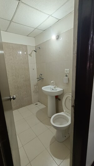 Bathroom in 2 BHK Apartment at Antriksh Golf View, Sector 78 – for Rent