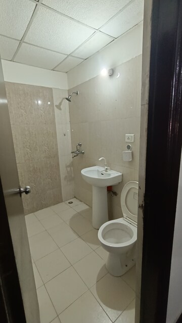 Bathroom in 2 BHK Apartment at Antriksh Golf View, Sector 78 – for Rent