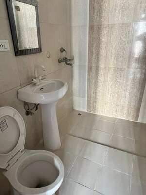 Bathroom in 2 BHK Apartment at Antriksh Golf View, Sector 78 – for Rent