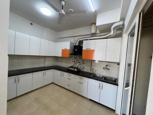 Kitchen in 2 BHK Apartment at Gaur Atulyam, Omicron I Greater Noida – for Rent
