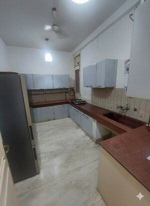 Kitchen in 4 BHK Builder Floor at Greater Kailash I – for Rent