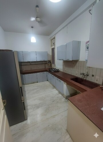 Kitchen in 4 BHK Builder Floor at Greater Kailash I – for Rent
