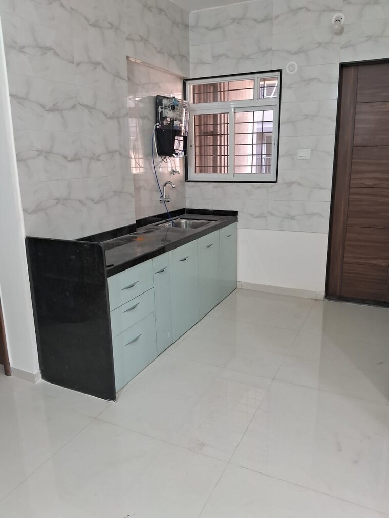Kitchen, veddant-ganesh-bella-rossa-phase-2 2 Bedroom 732 Sq.Ft. Apartment In Punawale Pune 9570314