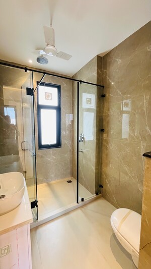Bathroom in 4 BHK Builder Floor at Ansal API Esencia, Sector 67 – for Sale