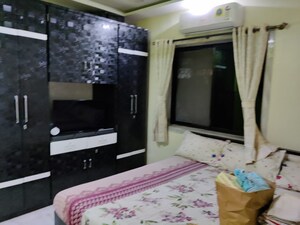 Bedroom in 2 BHK Apartment at Textila CHS, Prabhadevi – for Rent