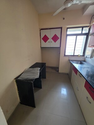 Kitchen in 1 BHK Apartment at Puranik Hometown, Ghodbunder Road – for Sale