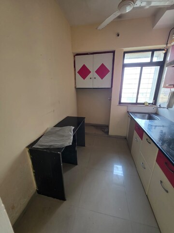 Kitchen in 1 BHK Apartment at Puranik Hometown, Ghodbunder Road – for Sale
