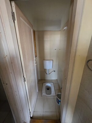 Bathroom in 1 BHK Apartment at Puranik Hometown, Ghodbunder Road – for Sale