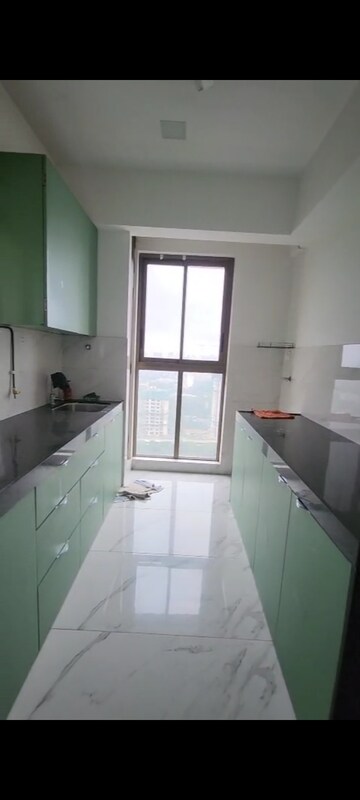 Kitchen in 2 BHK Apartment at Raymond Ten X Habitat, Pokhran Road No Two – for Rent