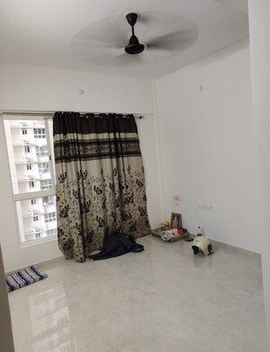 Living Room in 1 BHK Apartment at Lodha Amara, Kolshet Road – for Sale