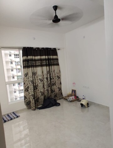 Living Room in 1 BHK Apartment at Lodha Amara, Kolshet Road – for Sale