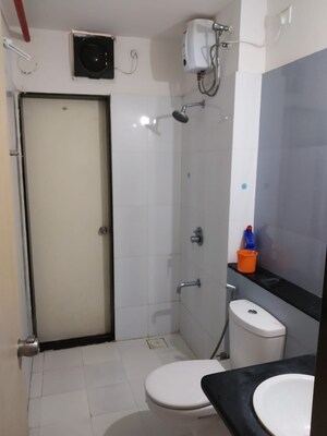 Bathroom in Studio Apartment at Paranjape Blue Ridge, Hinjewadi – for Sale