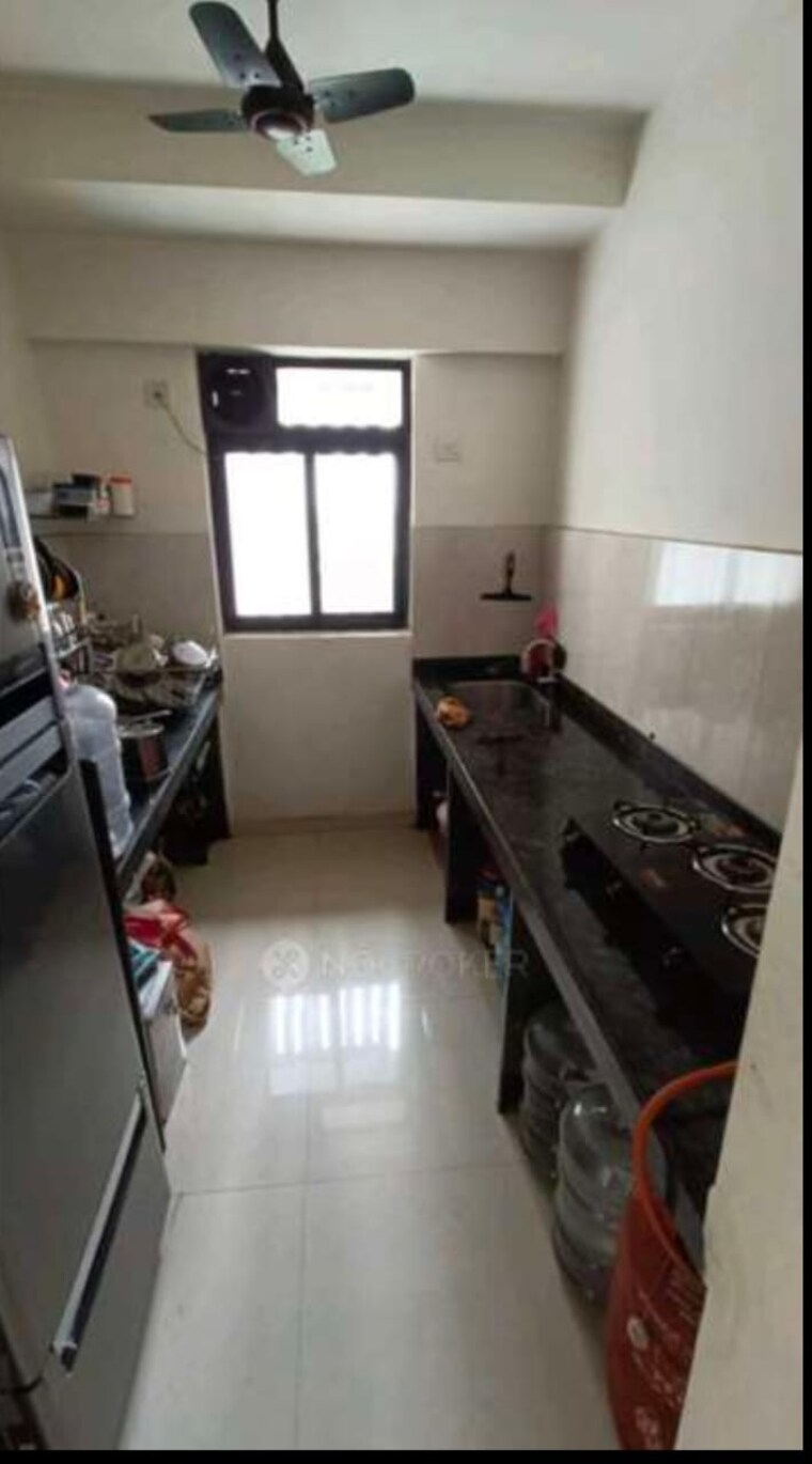 Kitchen, manohar-vikas-shreeji-paraiso-phase-i 3 Bedroom 1365 Sq.Ft. Apartment In Badlapur East Thane 9571114