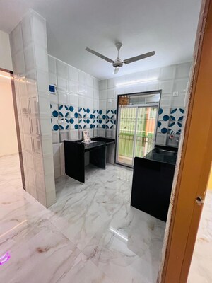 Kitchen in 3 BHK Apartment at Manohar Vikas Shreeji Paraiso Phase I, Badlapur East – for Sale
