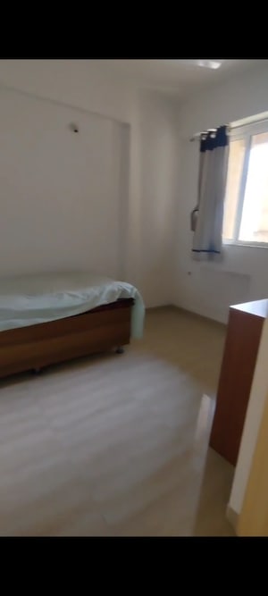 Bedroom in 2.5 BHK Apartment at Hiranandani Paloma, Ghodbunder Road – for Rent