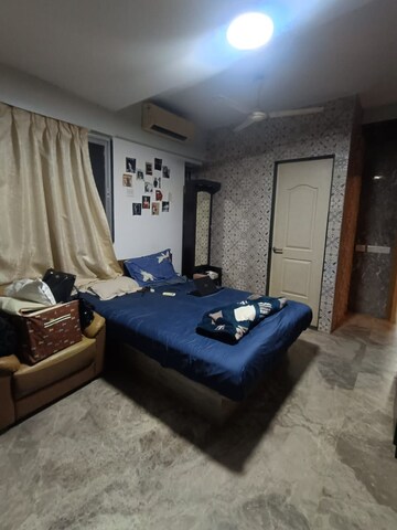 Living Room in 2 BHK Apartment at Dosti Flamingos, Parel – for Rent