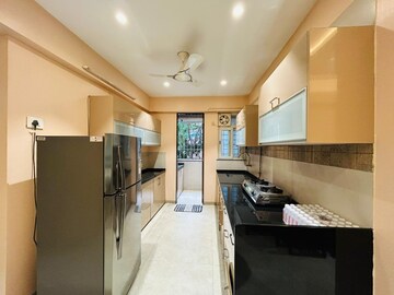 Kitchen in 2 BHK Apartment at Ajit Giripushp, Erandwane – for Sale