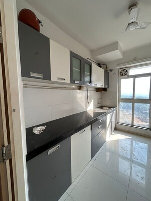 Kitchen in 2 BHK Apartment at Rutu Enclave, Kasarvadavali – for Rent