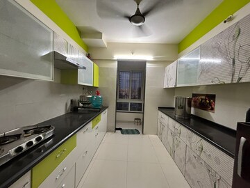 Kitchen in 1 BHK Apartment at Raunak Unnathi Woods Phase 7 A And B, Ghodbunder Road – for Rent