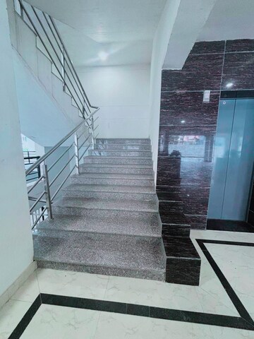 Staircase in 2 BHK Apartment at Nirman KL Heights, Jankipuram – for Sale