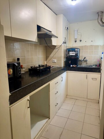 Kitchen in 1 BHK Apartment at Paras Seasons, Sector 168 – for Sale