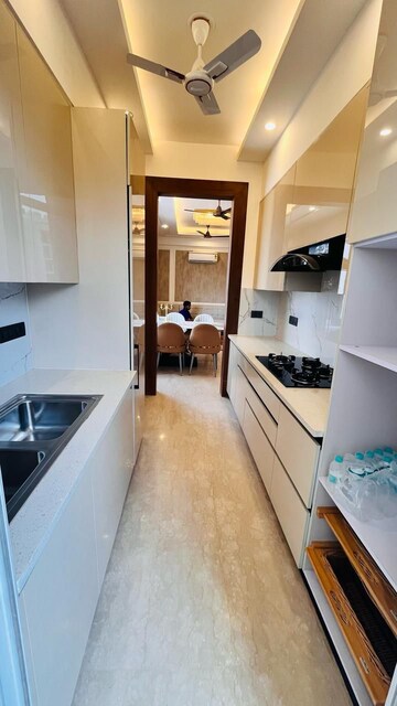 Kitchen in 4 BHK Builder Floor at Ansal API Esencia, Sector 67 – for Sale