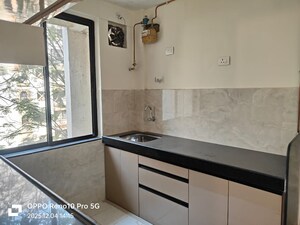 Kitchen in 1 BHK Apartment at Hiranandani Gardens Canna, Powai – for Rent