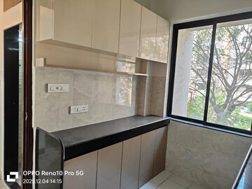 Kitchen in 1 BHK Apartment at Hiranandani Gardens Canna, Powai – for Rent