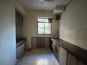 Kitchen in 1.5 BHK Apartment at Dss Mahavir Estella, Ghodbunder Road – for Rent