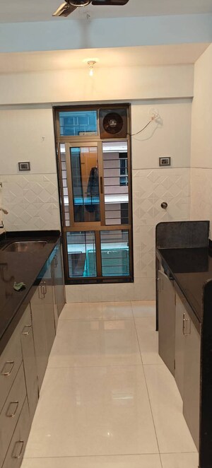 Kitchen in 1 BHK Apartment at Shiv Shakti Tower 28, Malad East – for Rent
