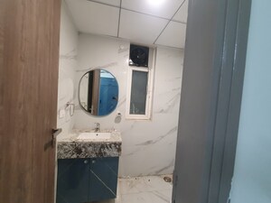 Bathroom in 3 BHK Apartment at Smart World Gems, Sector 89 – for Rent