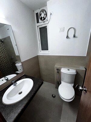 Bathroom in 3 BHK Apartment at ATS Happy Trails, Sector 10 Greater Noida – for Rent