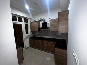 Kitchen in 3 BHK Apartment at ATS Happy Trails, Sector 10 Greater Noida – for Rent