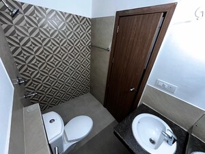 Bathroom in 3 BHK Apartment at ATS Happy Trails, Sector 10 Greater Noida – for Rent