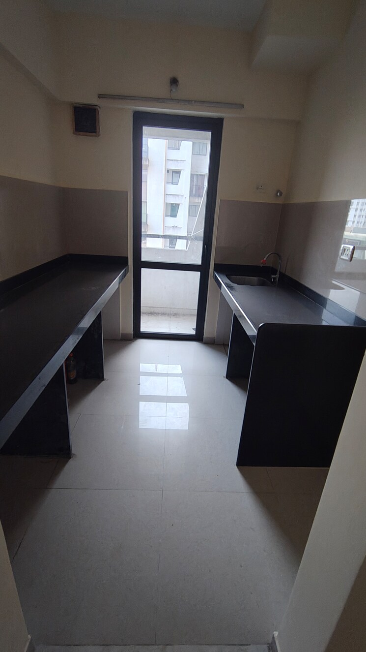 Kitchen, lodha-palava-city-lakeshore-greens 1 Bedroom 810 Sq.Ft. Apartment In Dombivli East Thane 9571926