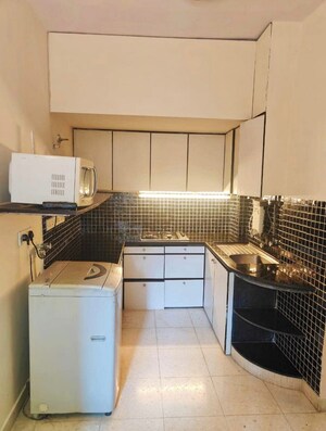 Kitchen in 1 BHK Apartment at Bandra West – for Rent