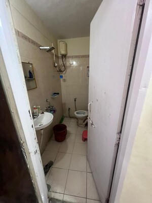 Bathroom in 1 BHK Apartment at Lemon Tree Society, Dhanori – for Sale