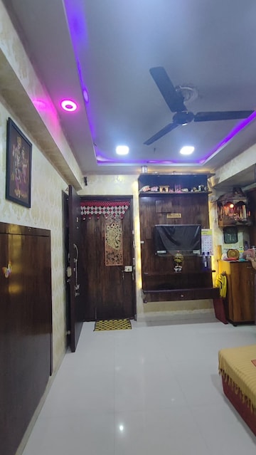 Living Room in 1 BHK Apartment at Shraddha Infinity, Bhandup West – for Sale