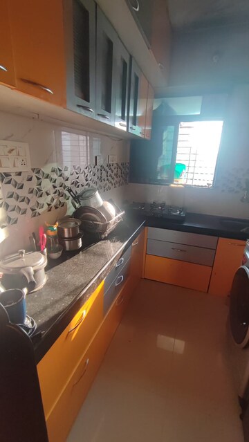 Kitchen in 1 BHK Apartment at Shraddha Infinity, Bhandup West – for Sale