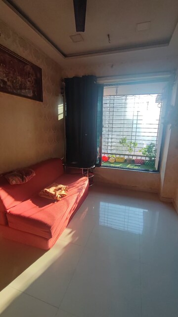 Living Room in 1 BHK Apartment at Shraddha Infinity, Bhandup West – for Sale