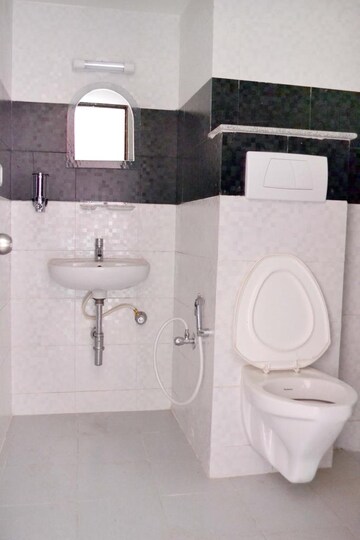 Bathroom in 4 BHK Apartment at Unishire The Ledge, Jakkuru – for Rent