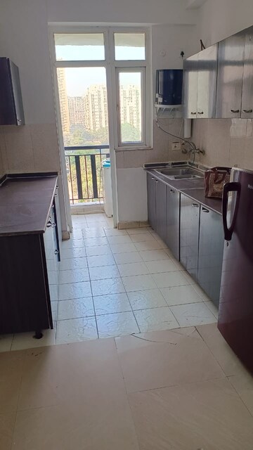 Kitchen in 3 BHK Apartment at Amrapali Princely Estate, Sector 76 – for Rent