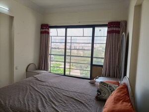 Bedroom in 2 BHK Apartment at Malad East – for Rent
