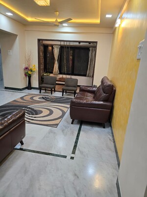 Living Room in 2 BHK Apartment at Kakade City, Karve Nagar – for Rent