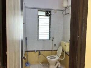 Bathroom in 3 BHK Apartment at Kshitij CHS Sanpada, Sanpada – for Rent