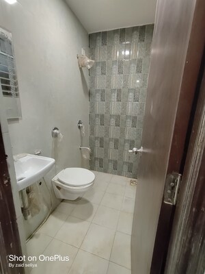 Bathroom in 1 BHK Apartment at Relliance Amann Highland Park, Malad East – for Sale