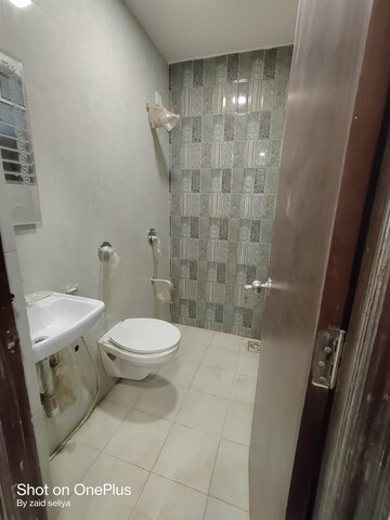 Bathroom in 1 BHK Apartment at Relliance Amann Highland Park, Malad East – for Sale