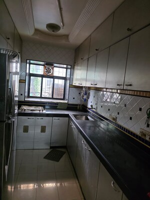 Kitchen in 2 BHK Apartment at Gee Jumbo Darshan, Andheri East – for Rent