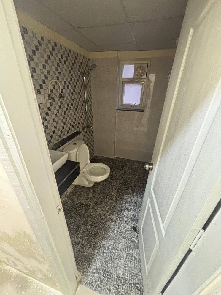 Bathroom, shri-radha-sky-gardens 3 Bedroom 1465 Sq.Ft. Apartment In Sector 16b Greater Noida Greater Noida 9573042