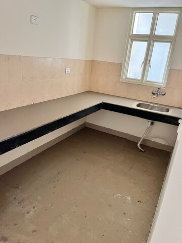 Kitchen in 3 BHK Apartment at Shree Ganesh Apartments CGHS, Sector 45 – for Sale